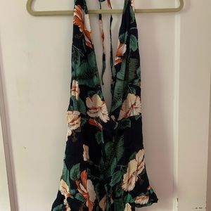 Floral low cut, never worn, open back romper!
